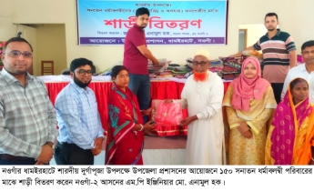 আদমদীঘিতে ১৫০ পরিবারকে নতুন শাড়ি দিলেন এমপি এনামুল হক